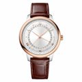 Dress watch with silver dial, rose gold bezel, and brown leather strap