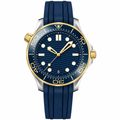 Blue dial diver watch with blue rubber strap and gold tone bezel, front view